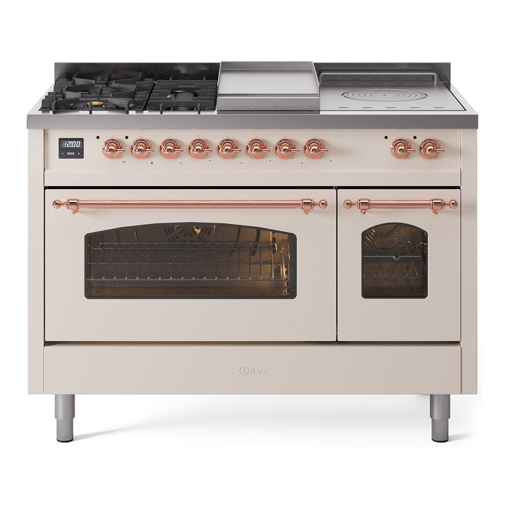 Antique white dual fuel range with copper control knobs and two glass oven doors.
