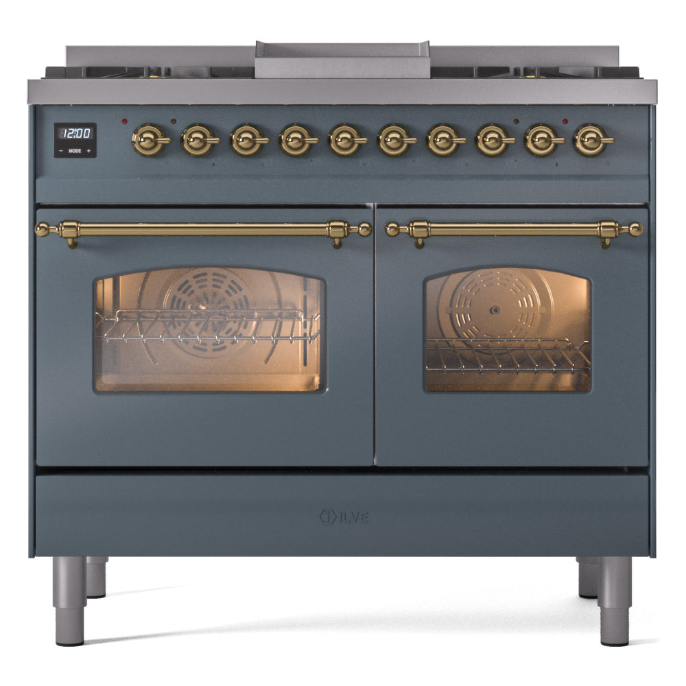 Blue grey freestanding range with brass control knobs and two oven doors with glass windows