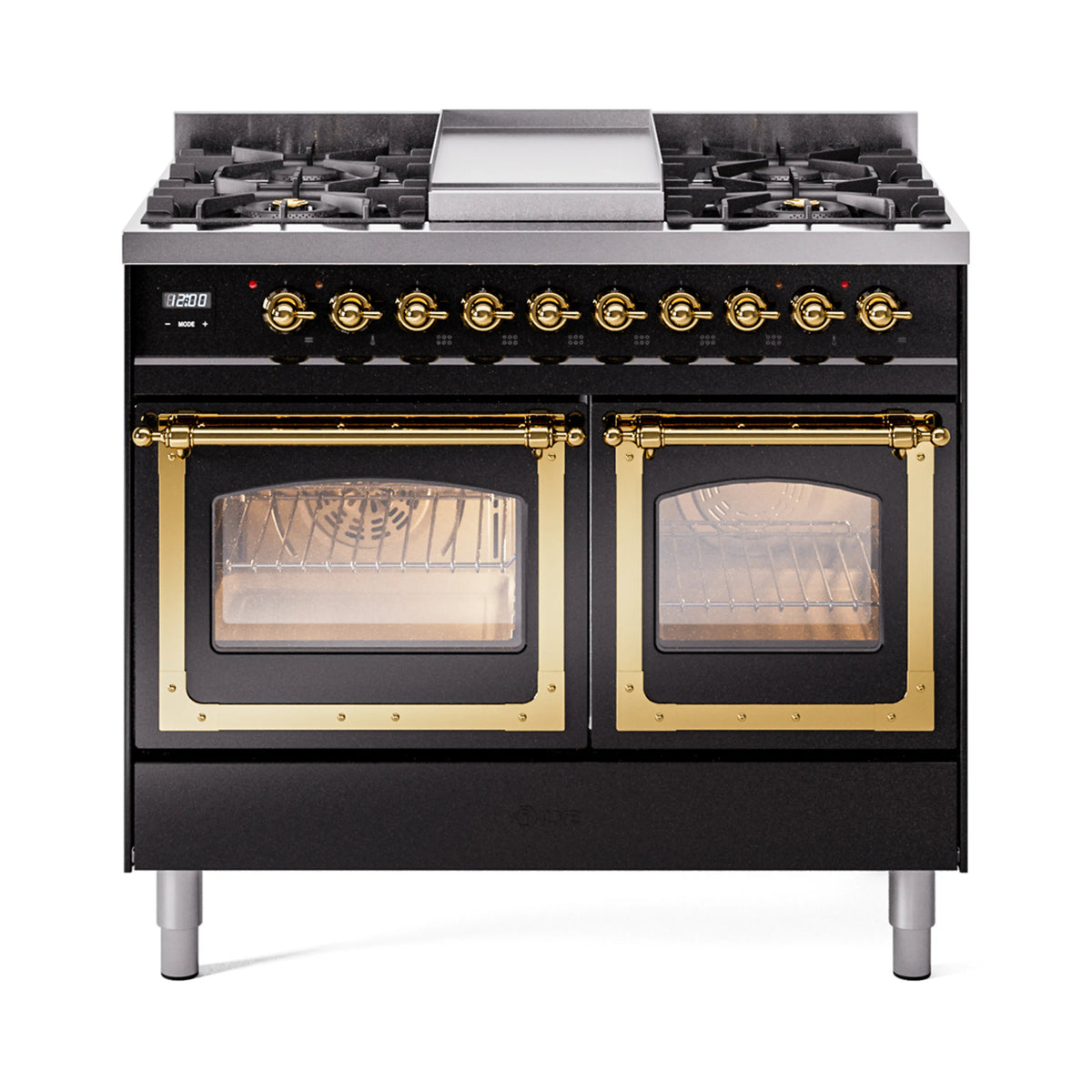 Glossy black dual fuel range with brass burner knobs and two glass oven windows