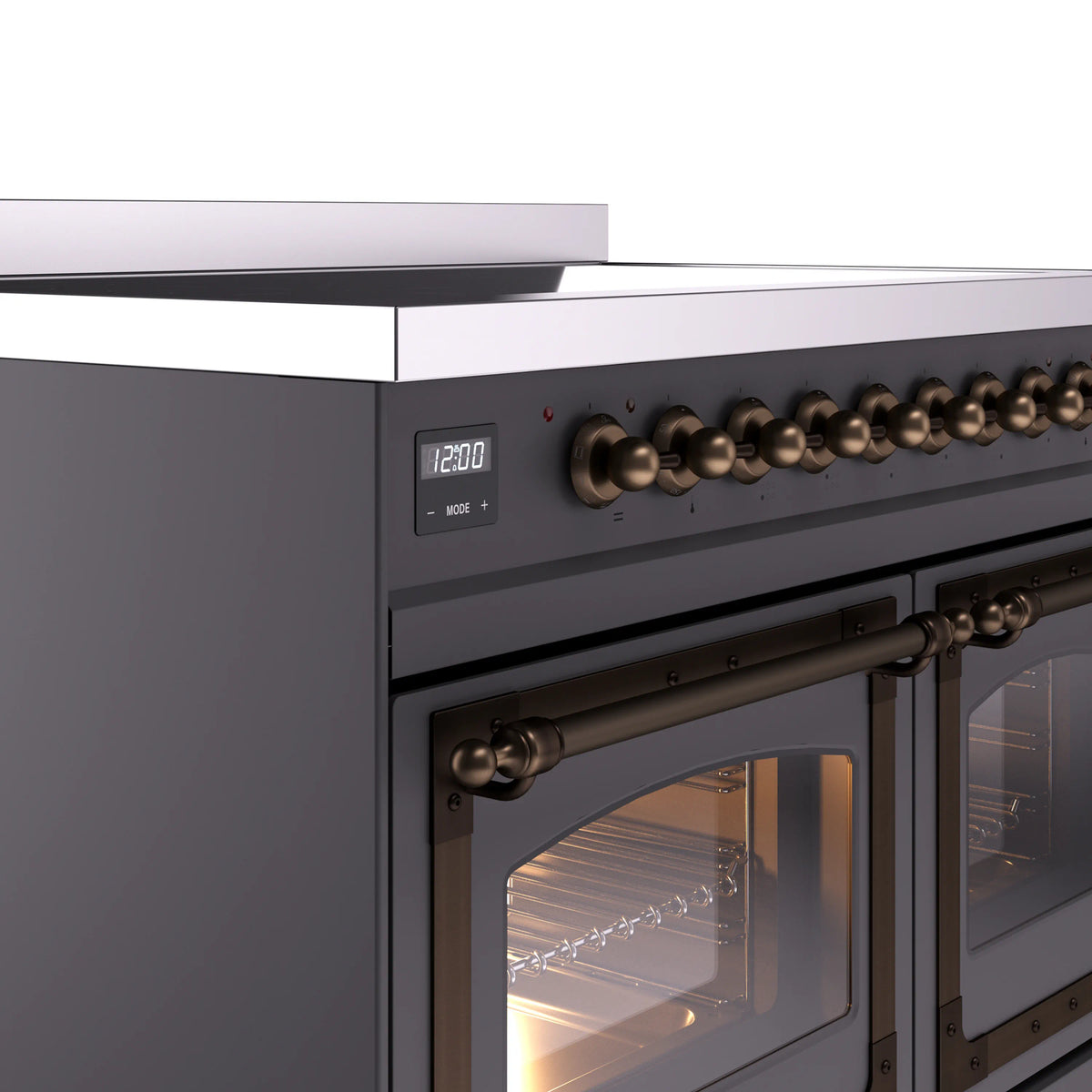 Matte graphite induction range with bronze knob panel and triple-glass oven door