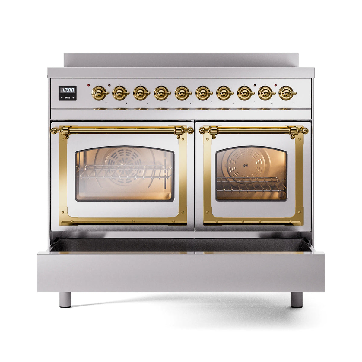 Stainless steel induction range with glass oven doors closed and brass trim