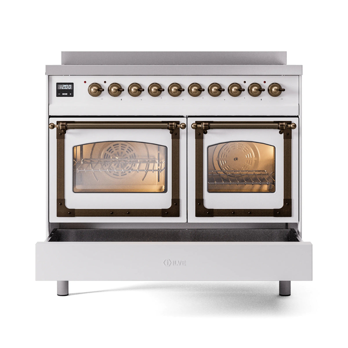 White induction range with bronze knobs and two glass oven doors