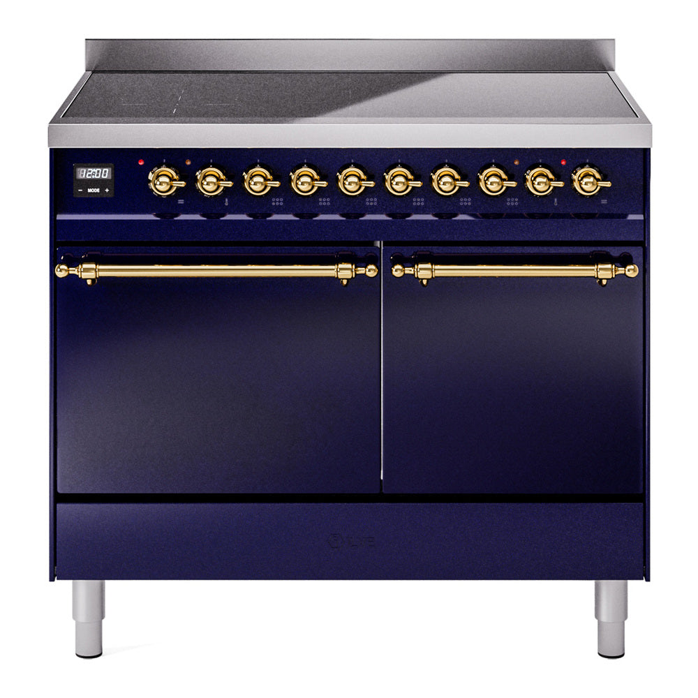 Midnight blue induction range with brass knobs, gold handles, and two oven doors