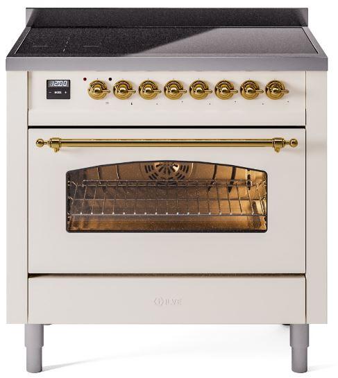 Antique white range with open oven door, brass handle, and glass window