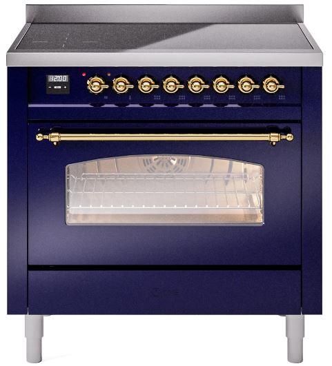 Midnight blue freestanding electric induction range with brass knobs and closed glass oven door
