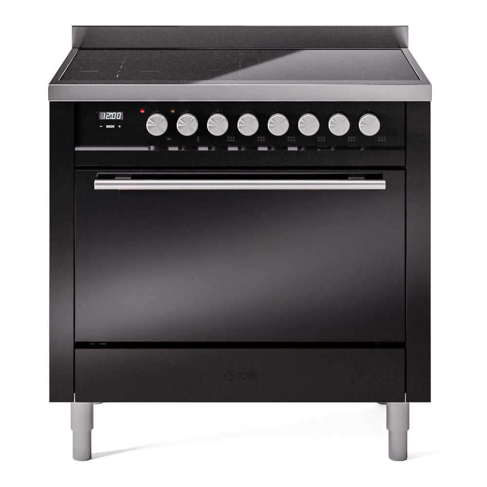 Glossy black induction range with control knobs and closed oven door