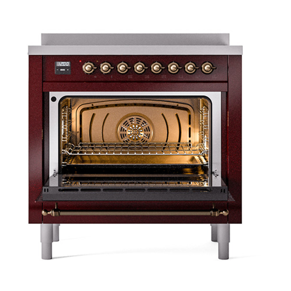Open oven door showing interior light, racks, and fan