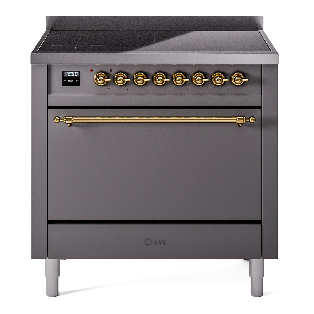 Matte graphite induction range with solid door oven, brass handle, and control panel knobs