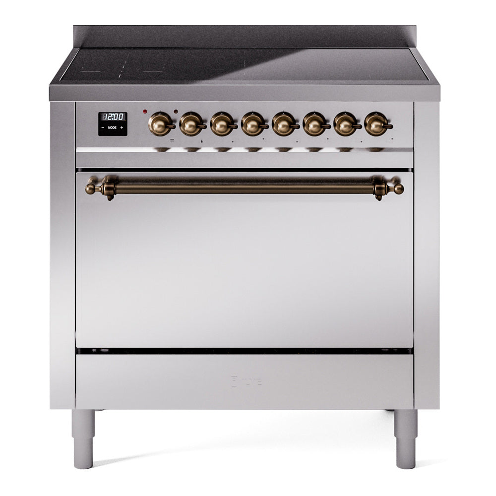 Stainless induction range with bronze control knobs, black cooktop, and closed oven
