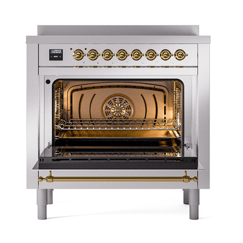 Stainless steel induction range oven door open with brass trim and wire rack