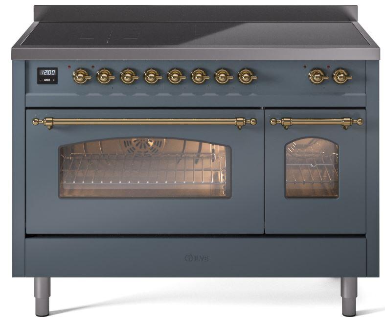 Blue-grey freestanding electric induction range with brass handles and two oven windows