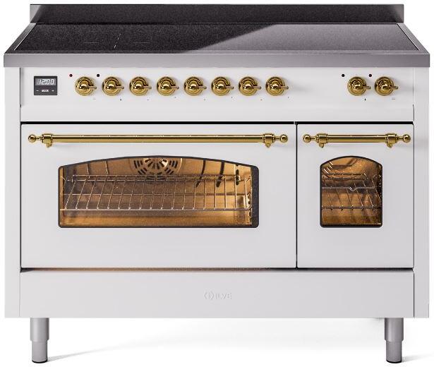 White induction range with brass trim, twin oven doors with arched windows