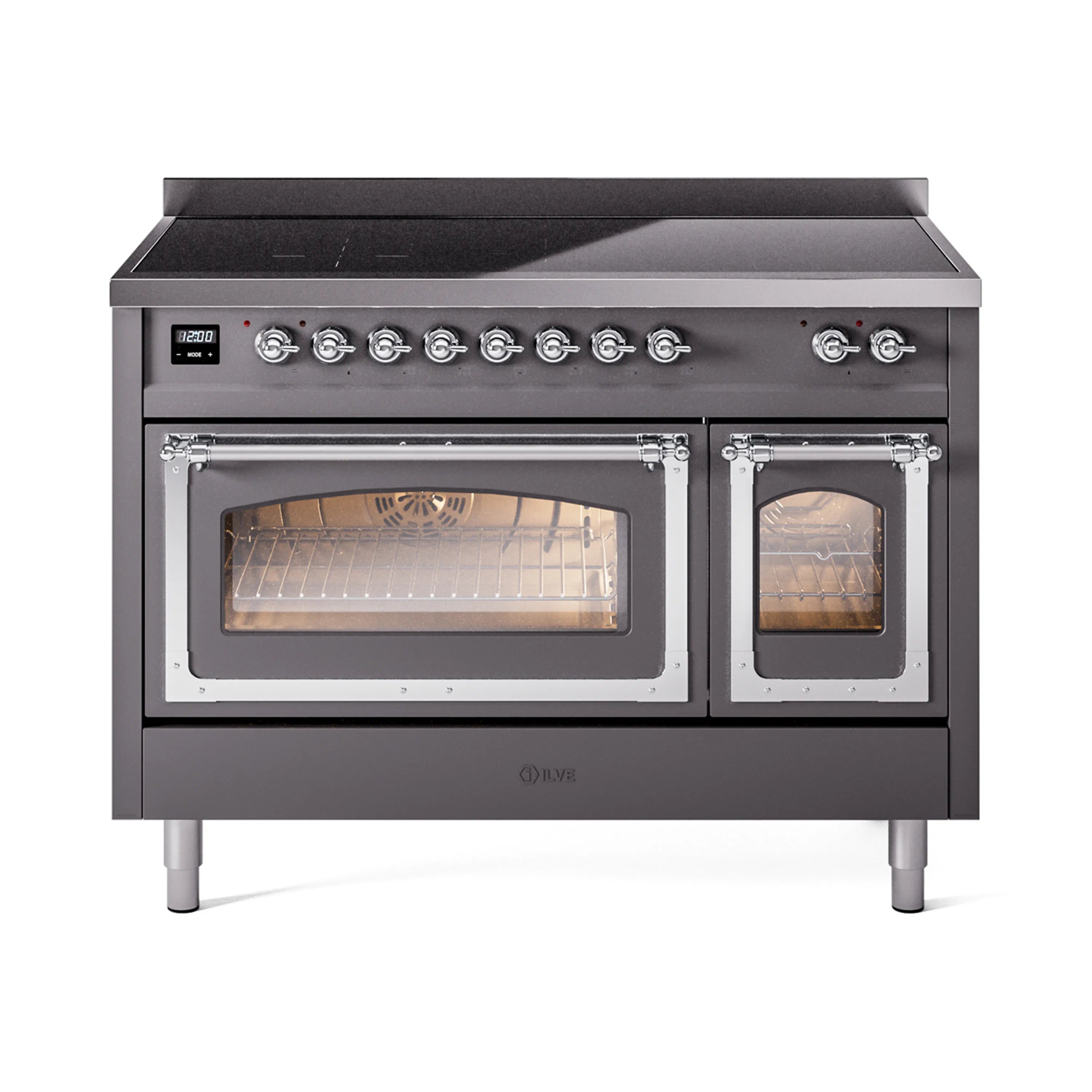 Matte graphite induction range with chrome-trim doors and lit oven cavity, front view.