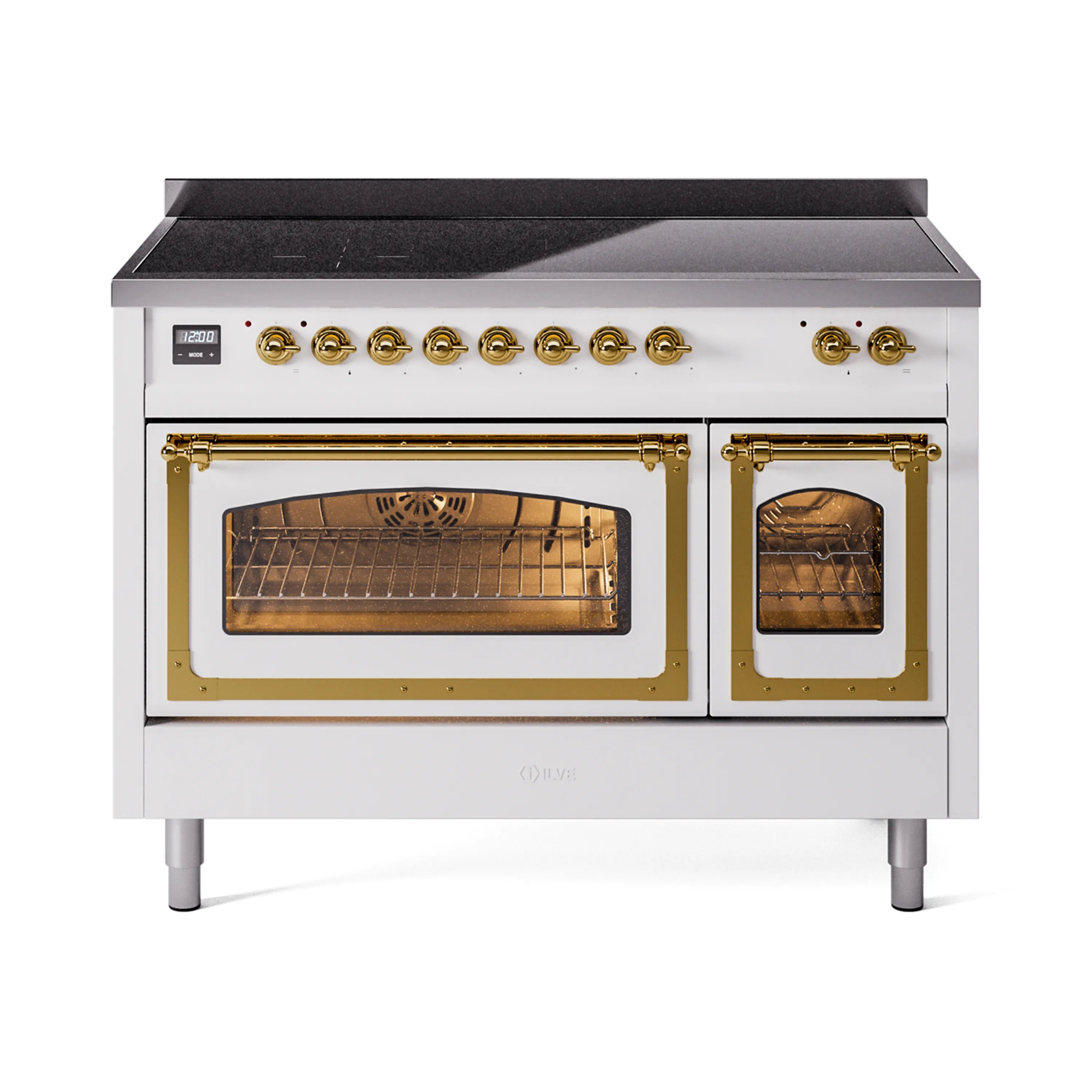White induction range with brass-framed glass oven doors and stovetop controls