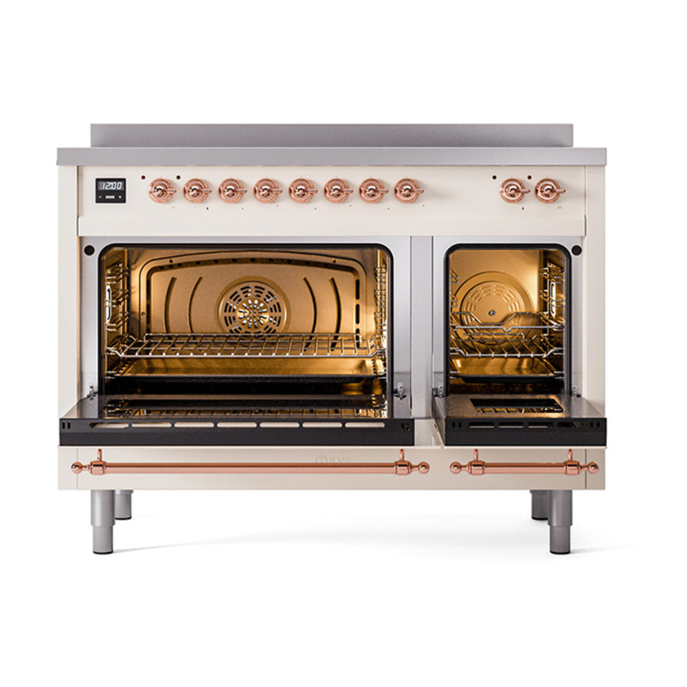 Antique white induction range with copper-trim controls and open double oven doors