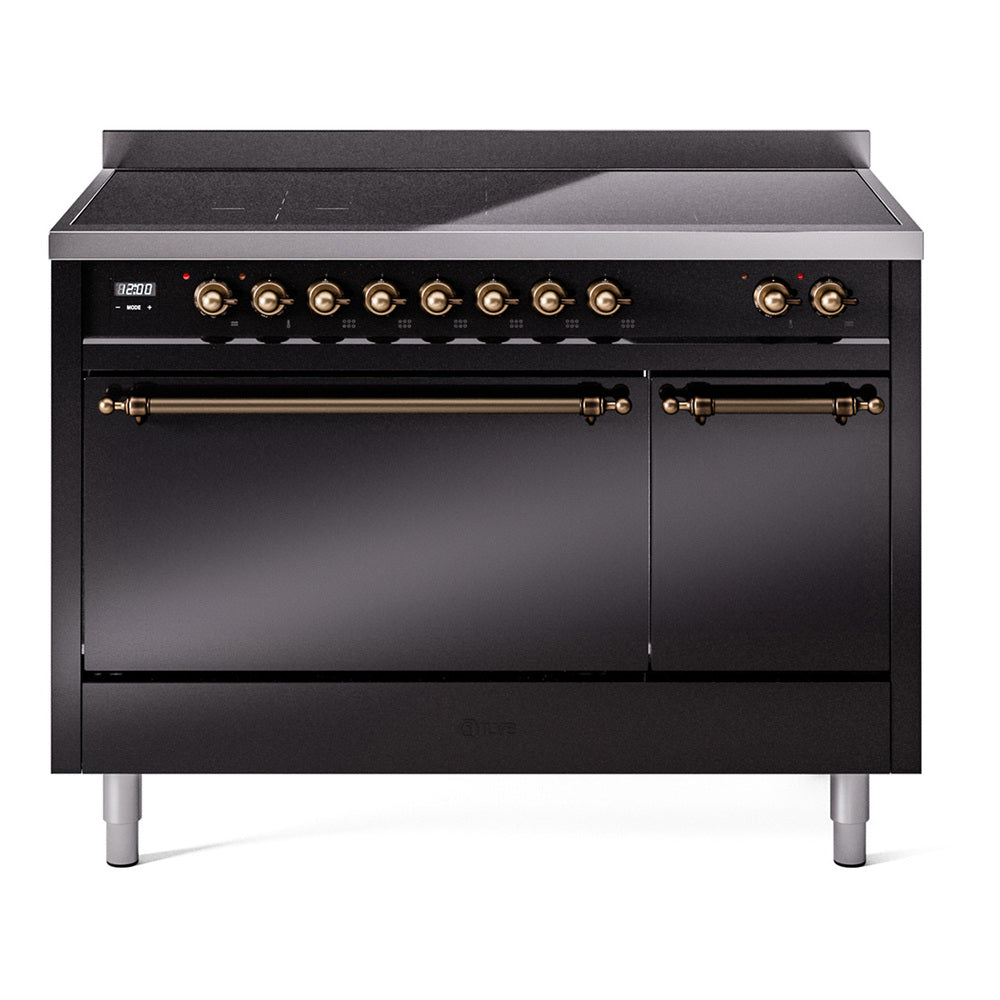 Glossy black induction range front with bronze control knobs and oven door