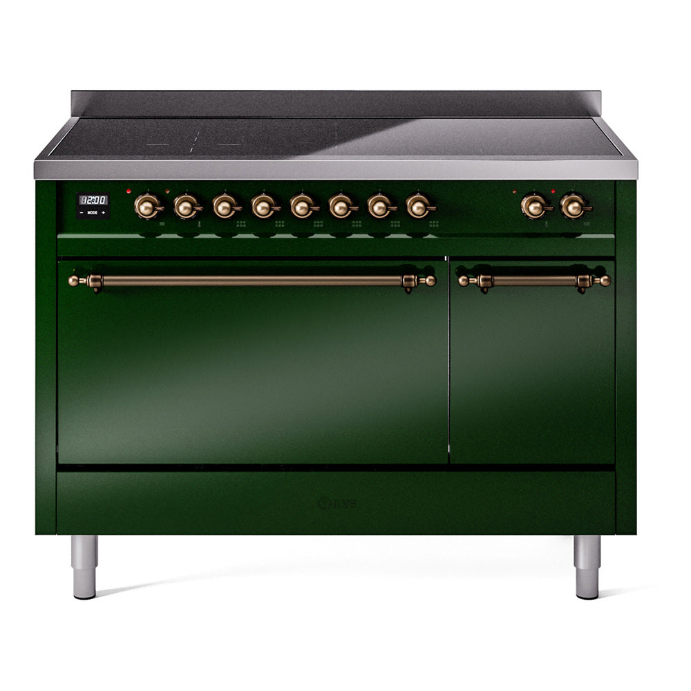 Emerald green range with bronze control knobs and black cooktop panel
