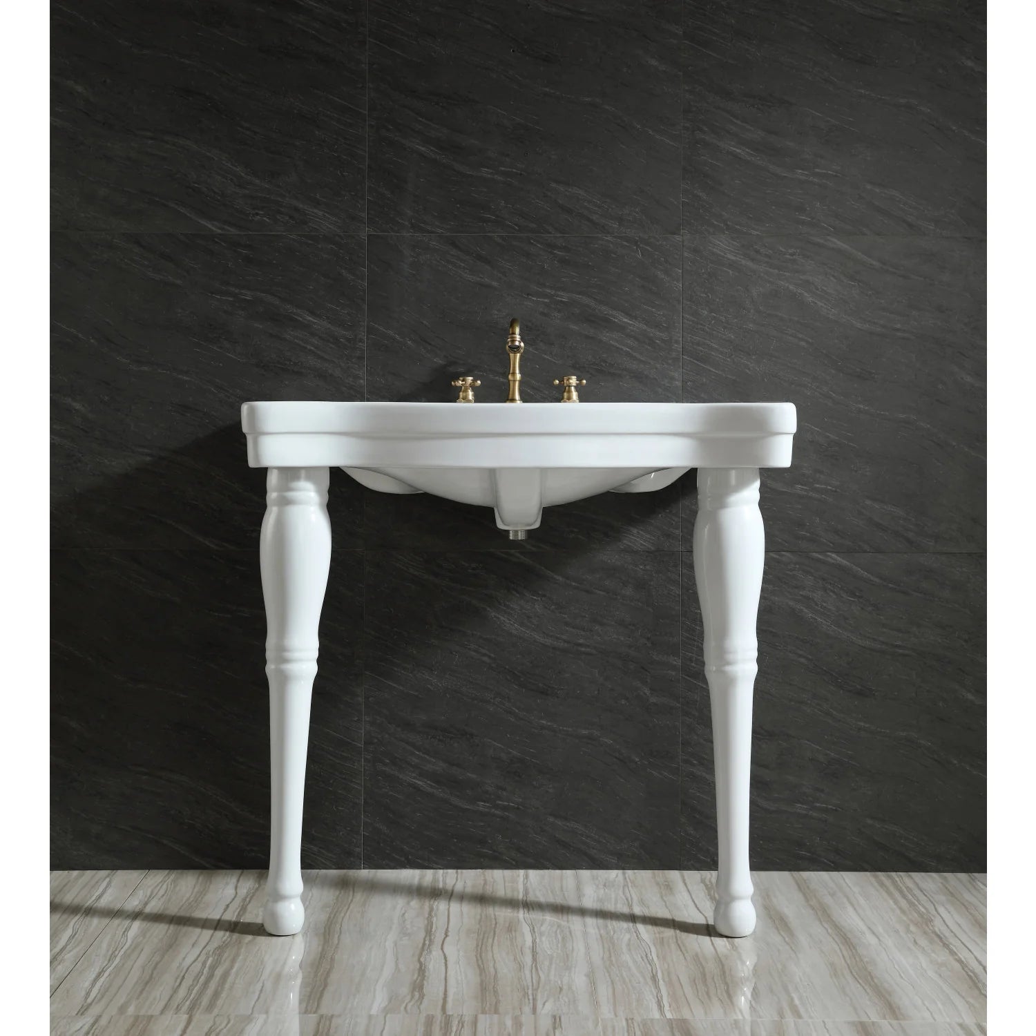 White ceramic console sink with legs, front view with gold faucet handles and single basin