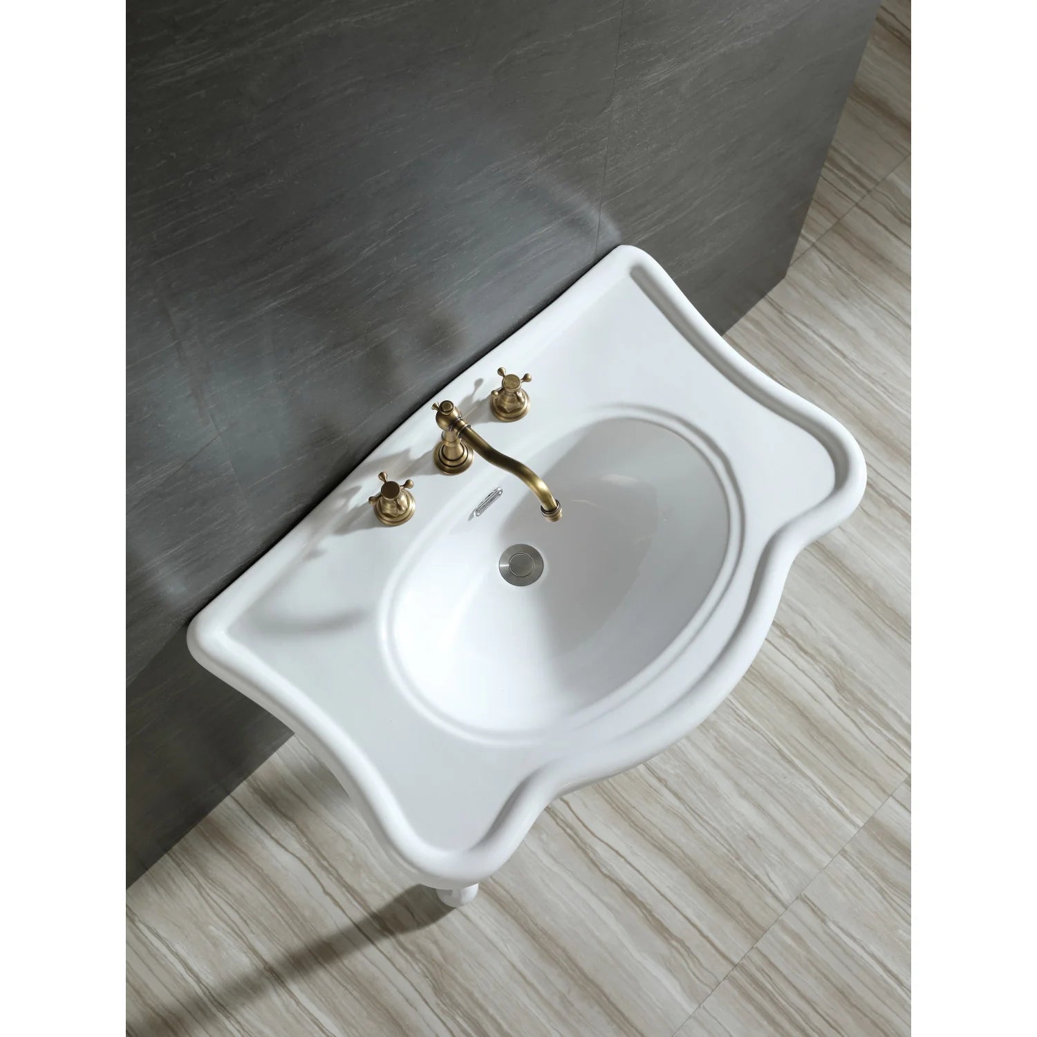 White ceramic console sink with gold deck-mount faucet set, oval single basin and legs