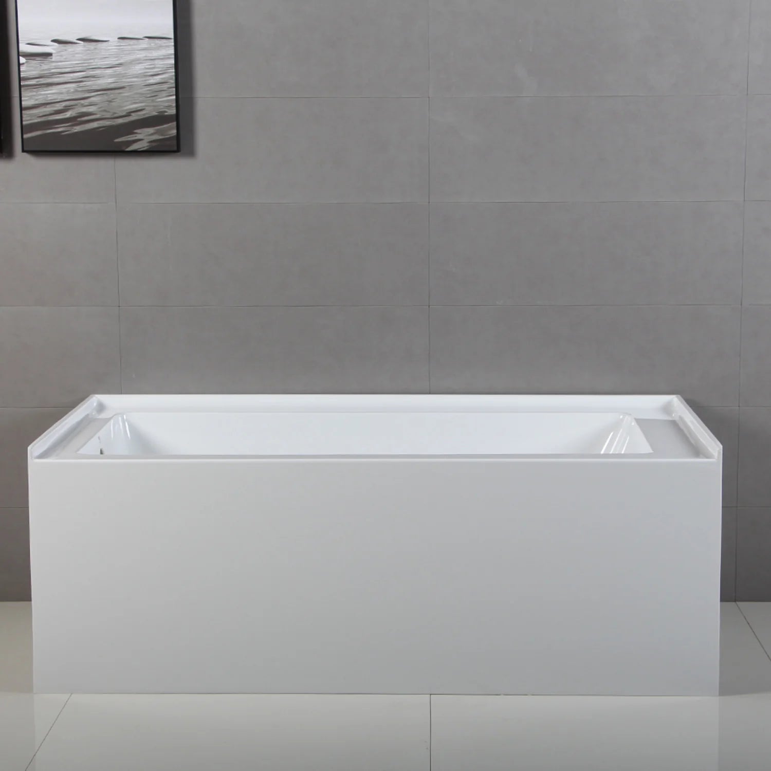 White acrylic rectangular alcove bathtub with wide rim and flat apron