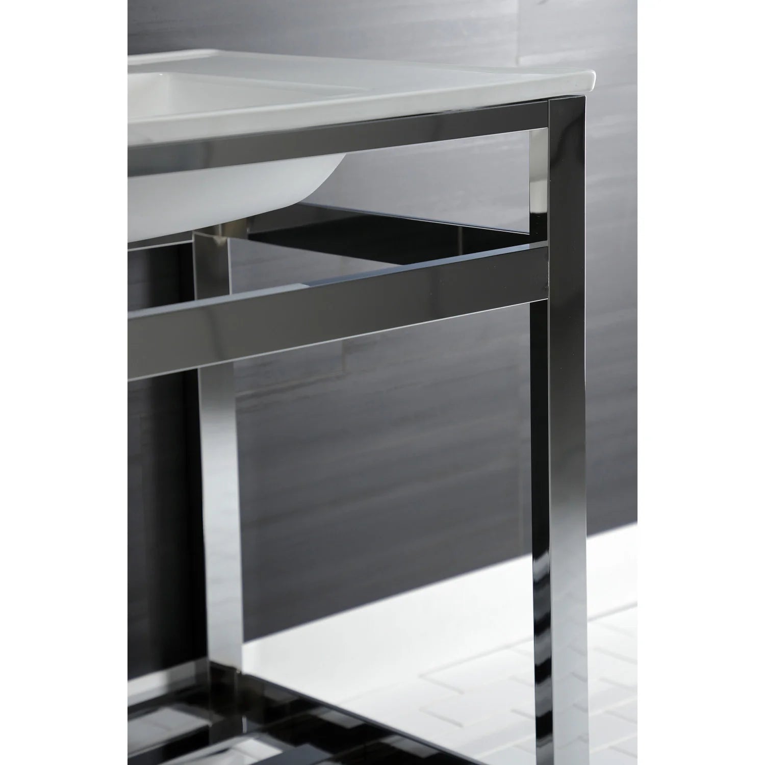 Chrome steel support frame with open storage shelf under a white ceramic console sink