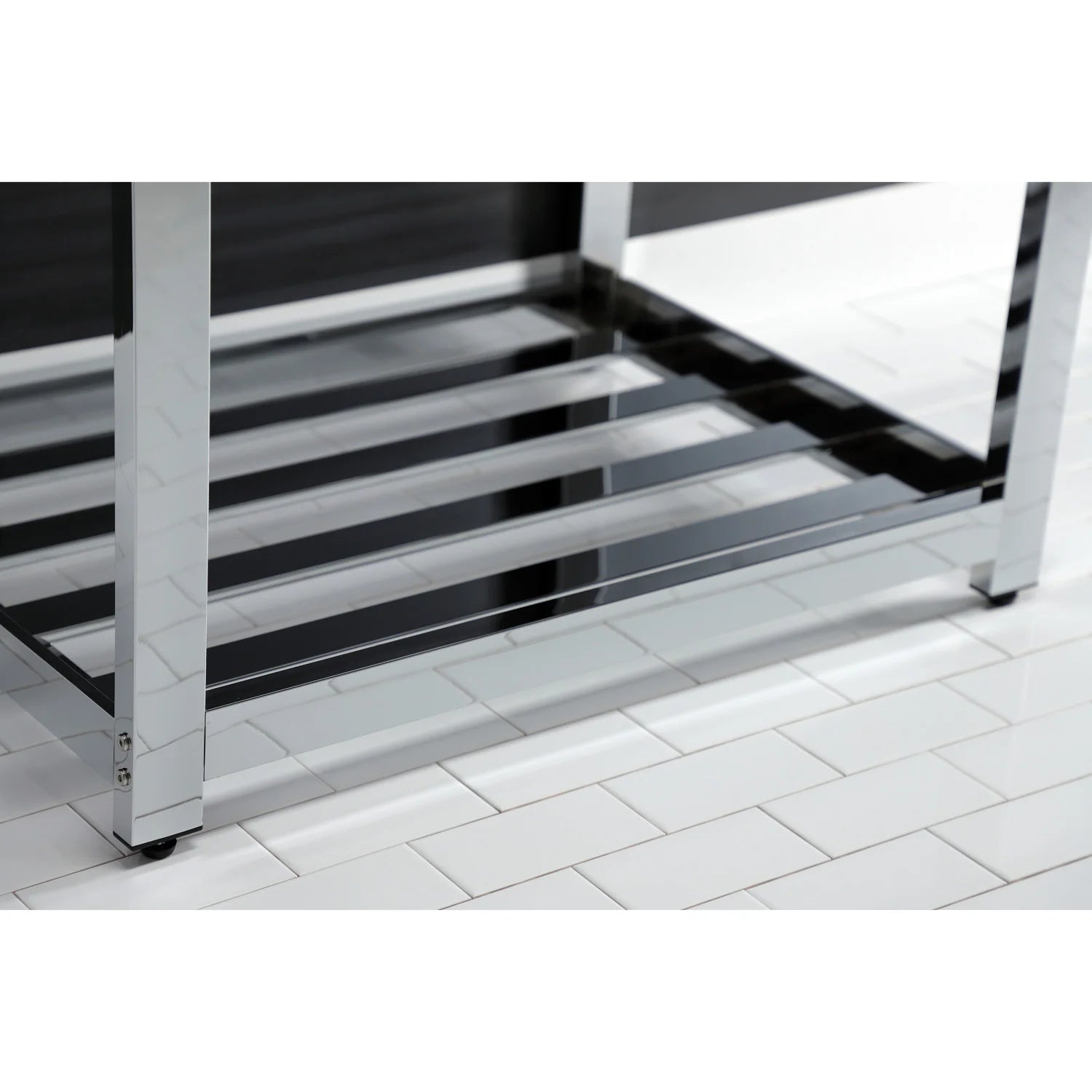 Chrome steel console base with open slatted shelf beneath a white ceramic sink