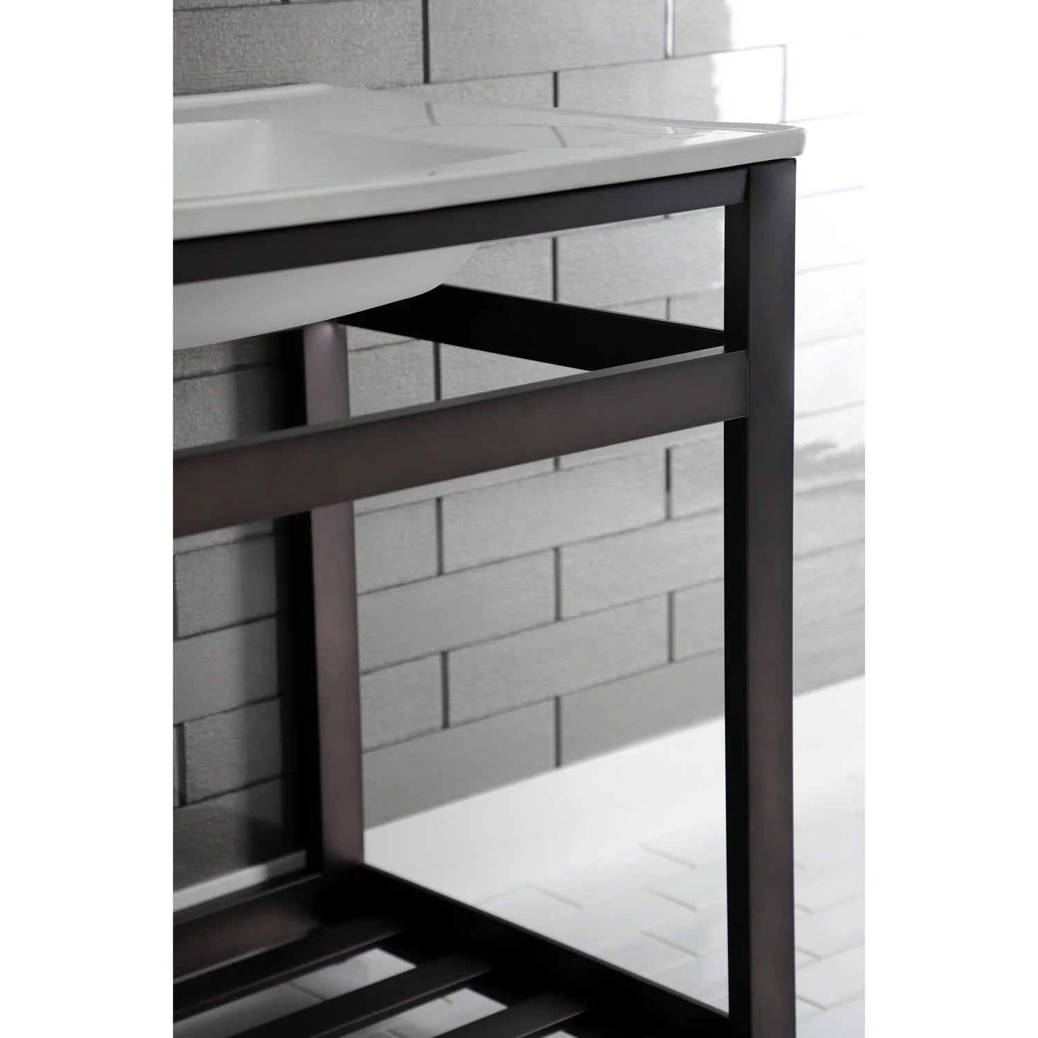 Dark bronze steel console sink base with open shelf under the white countertop