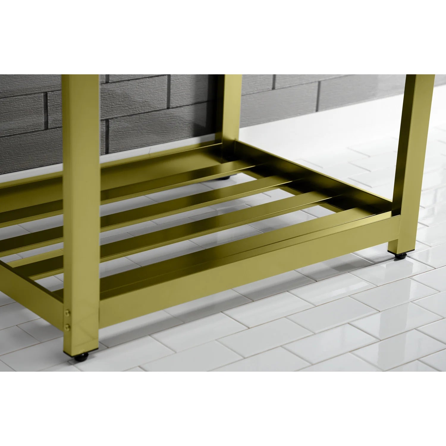 Brushed brass console sink base with open shelf and white ceramic basin