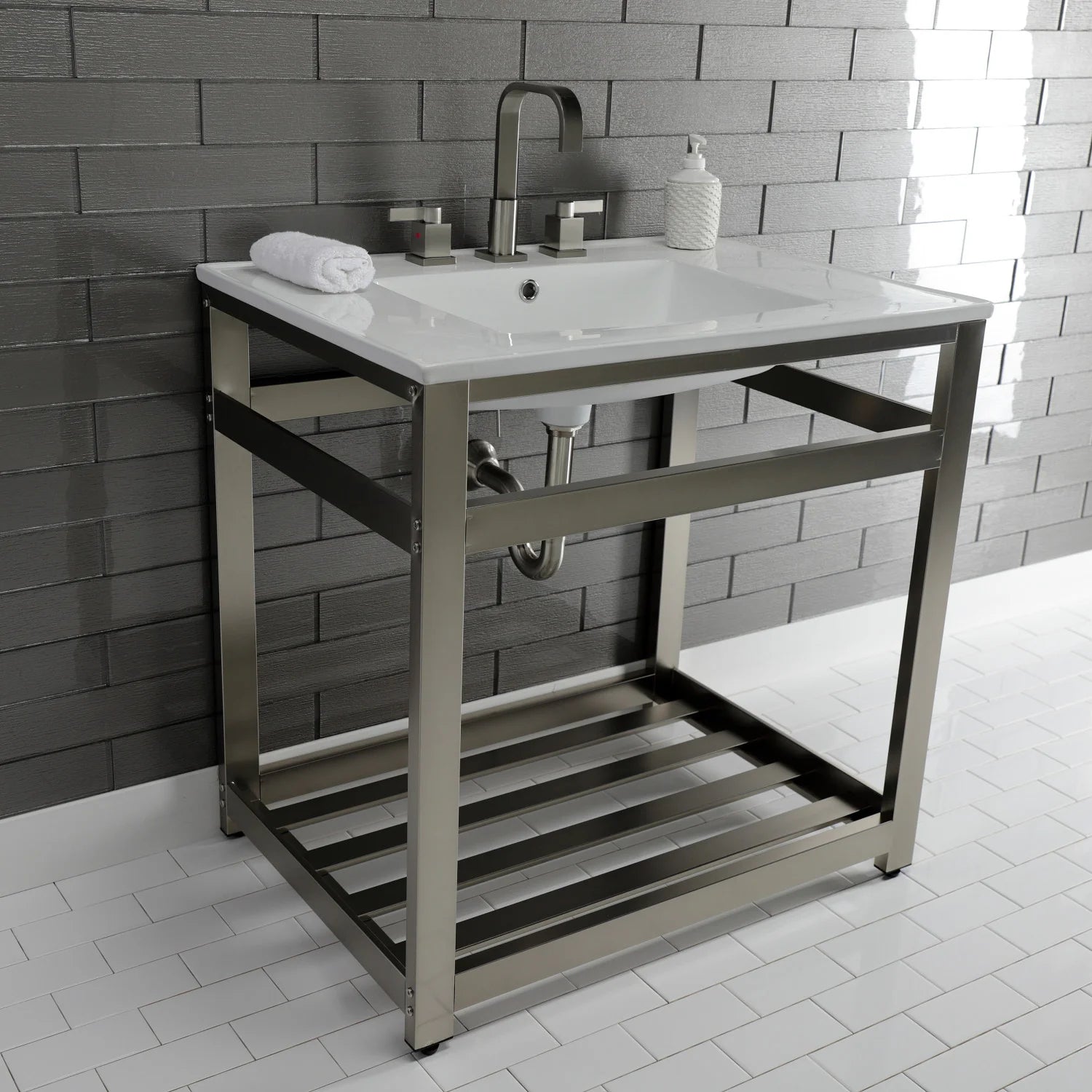 White ceramic console sink with brushed nickel faucet, steel base and lower shelf