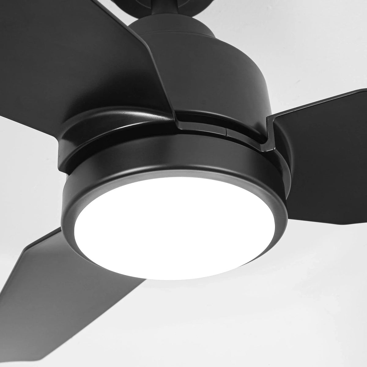 Black modern ceiling fan with bright LED light and visible motor housing