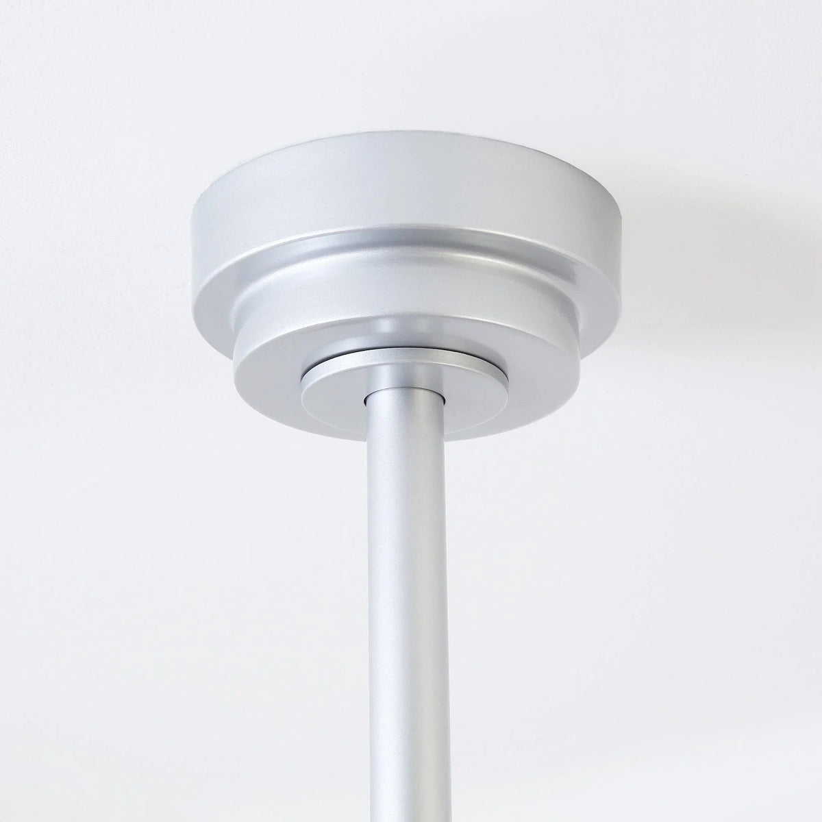 Modern ceiling fan downrod with round white ceiling mount and smooth white finish
