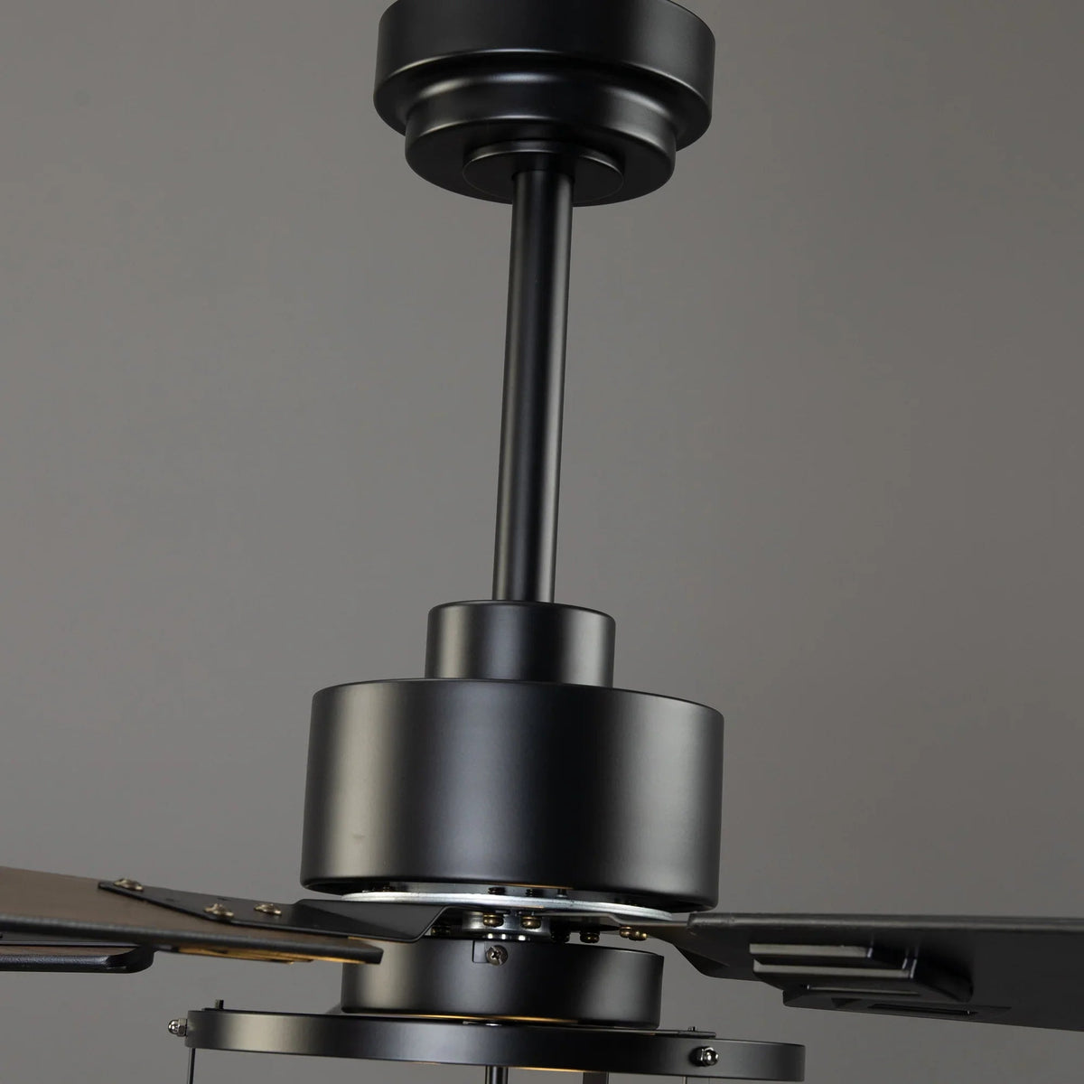 Ceiling fan motor housing with downrod mount and brushed metal canopy
