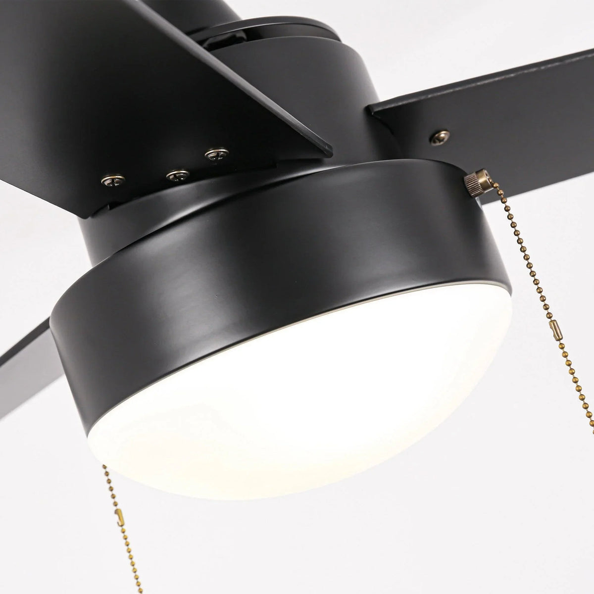 Black ceiling fan motor housing with frosted light and pull-chain cord