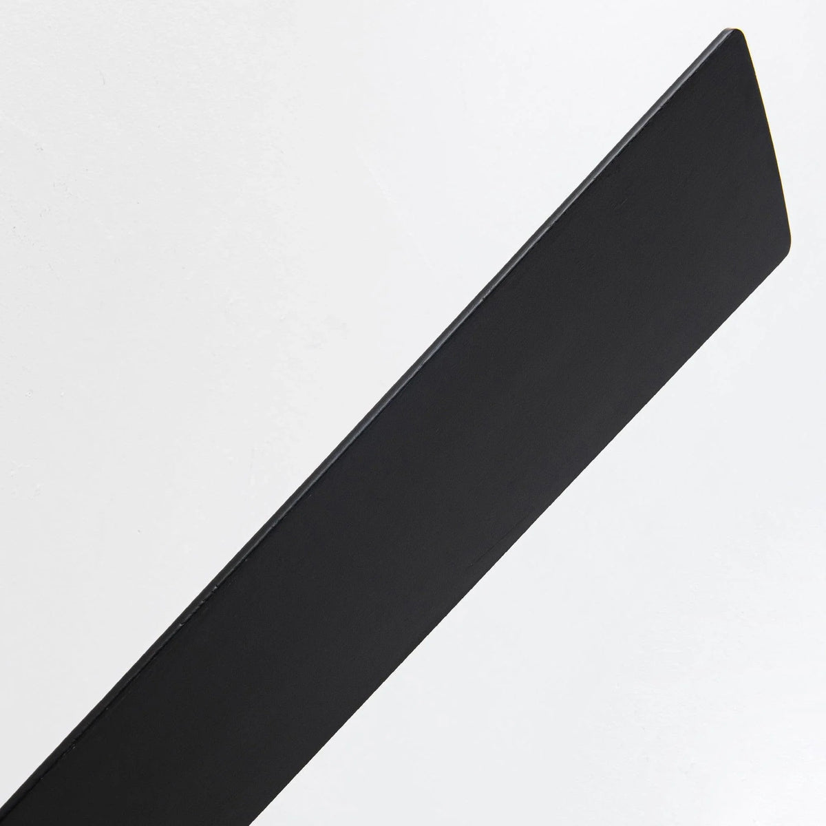 Black ceiling fan blade close-up