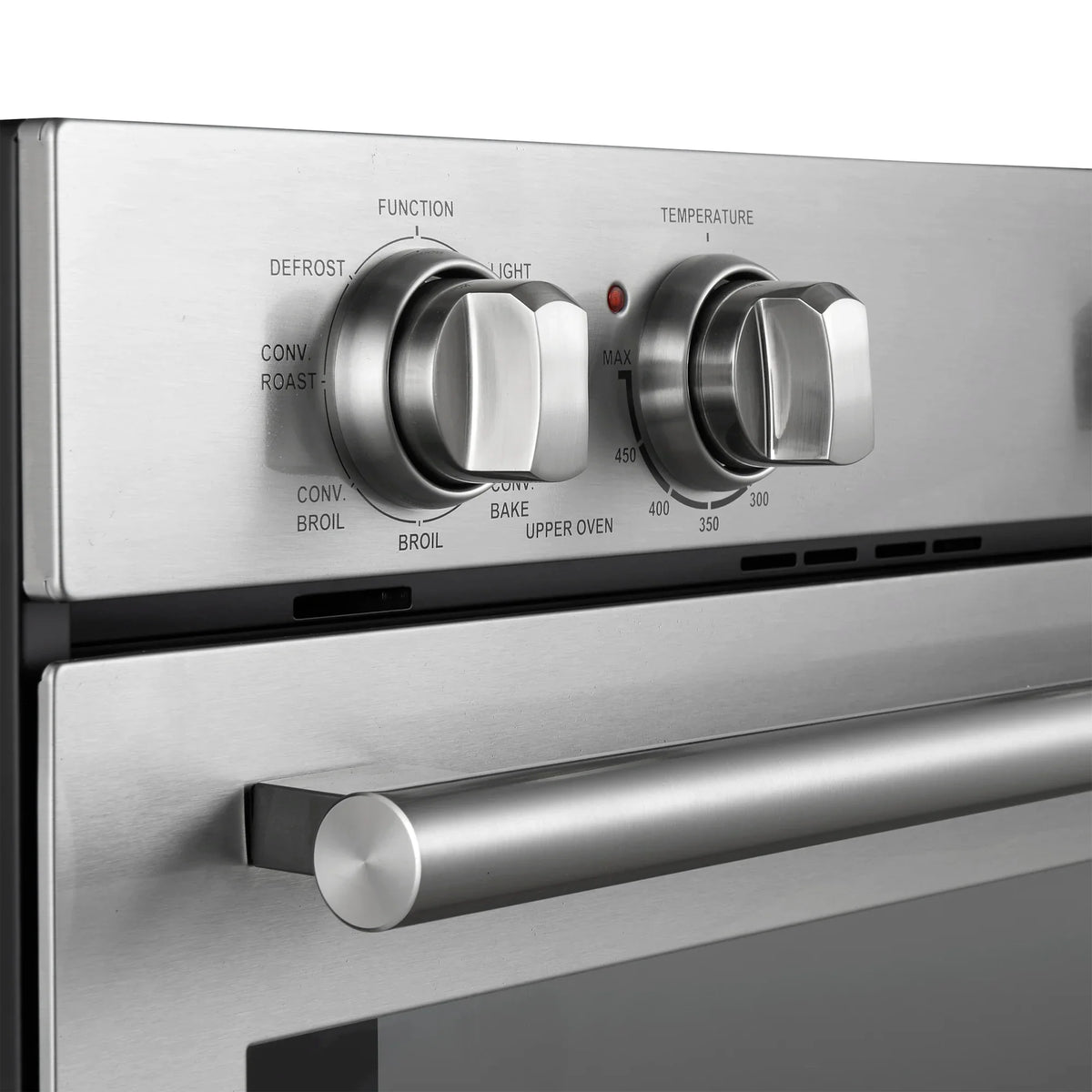 Close-up of stainless oven control panel with function and temperature knob settings