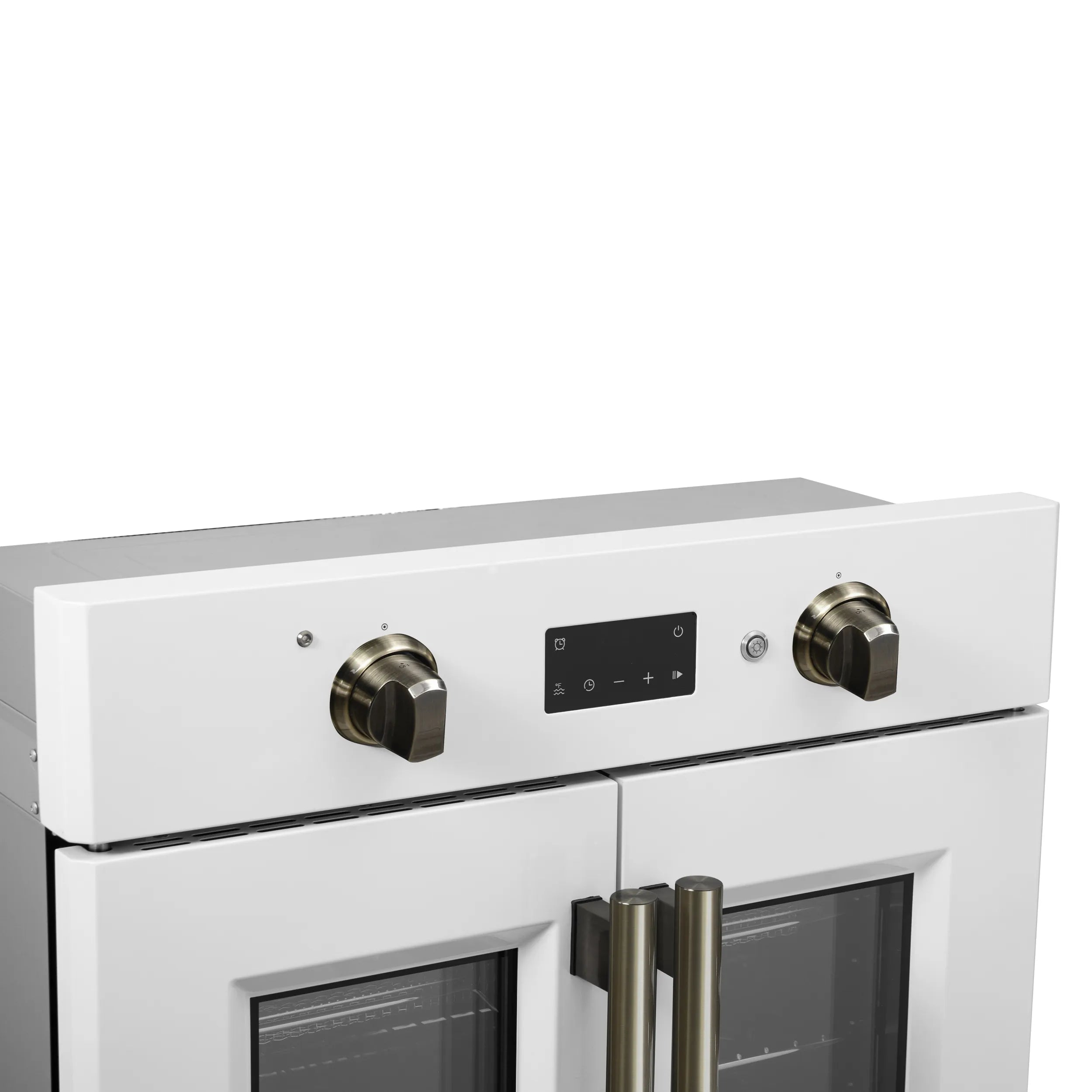 White electric wall oven control knobs and brass vertical handle bars