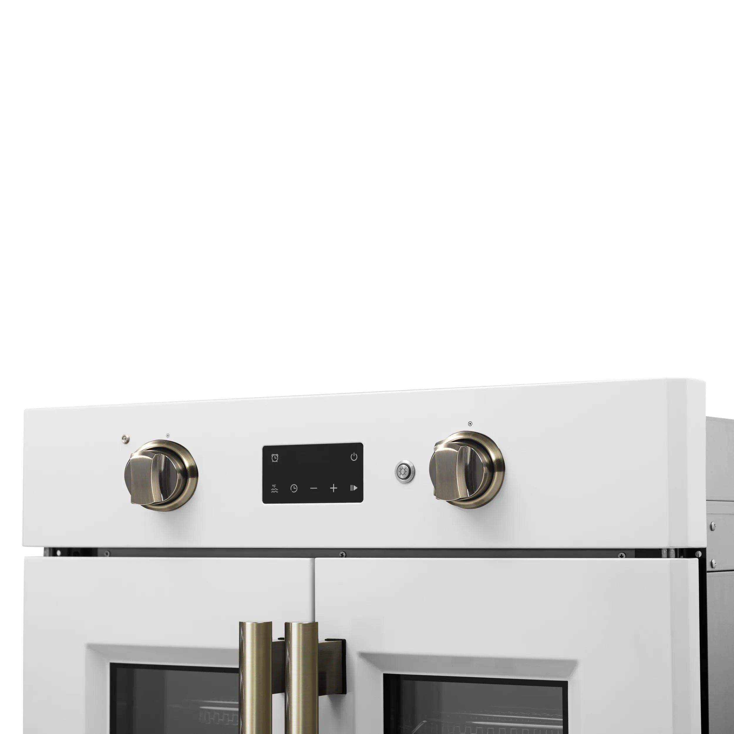 White wall oven control panel close-up with brass knobs and digital display