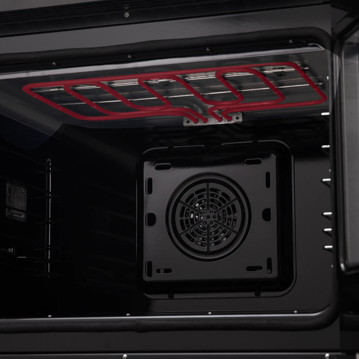 Black electric wall oven interior with round convection fan and back heating elements