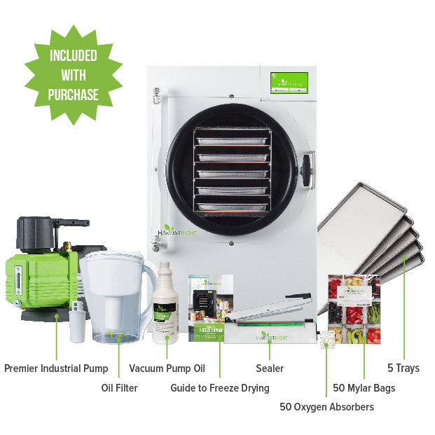 White freeze dryer kit with vacuum pump, oil filter, and included accessories