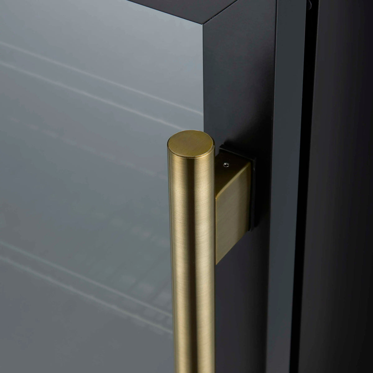 Black beverage cooler with antique brass door handle