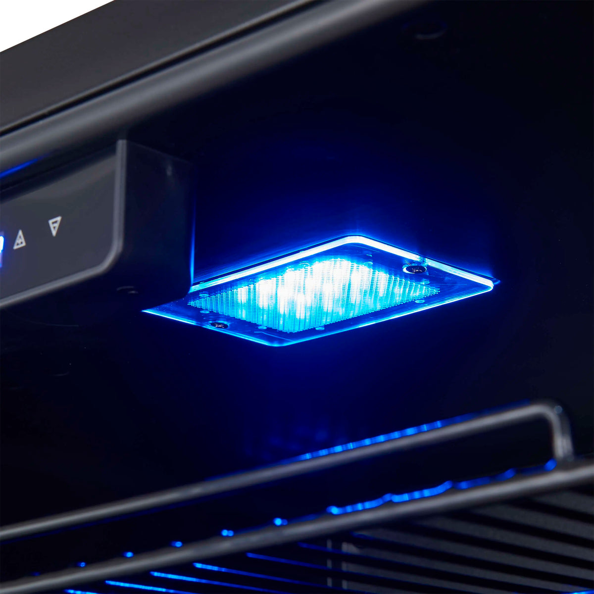 Blue LED-lit beverage cooler interior behind glass door and shelves