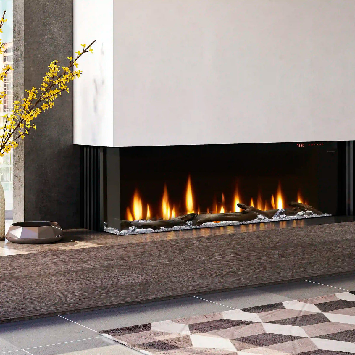 Linear electric fireplace in a dark wood mantel with visible black front and flames