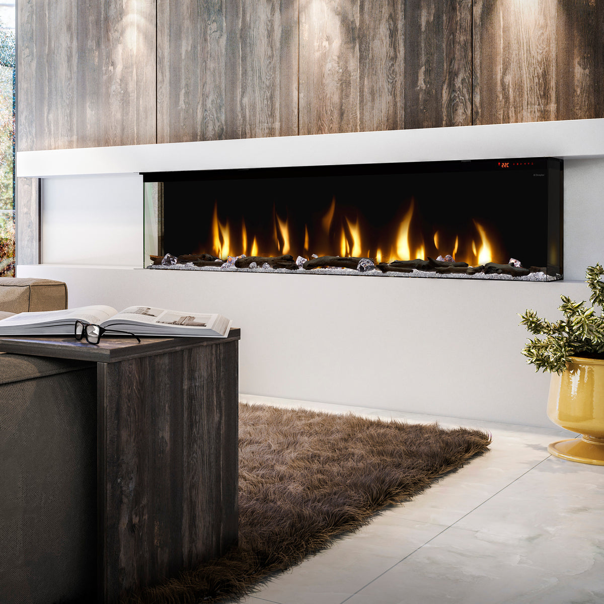 Built-in linear electric fireplace with yellow-orange flames in a recessed black frame