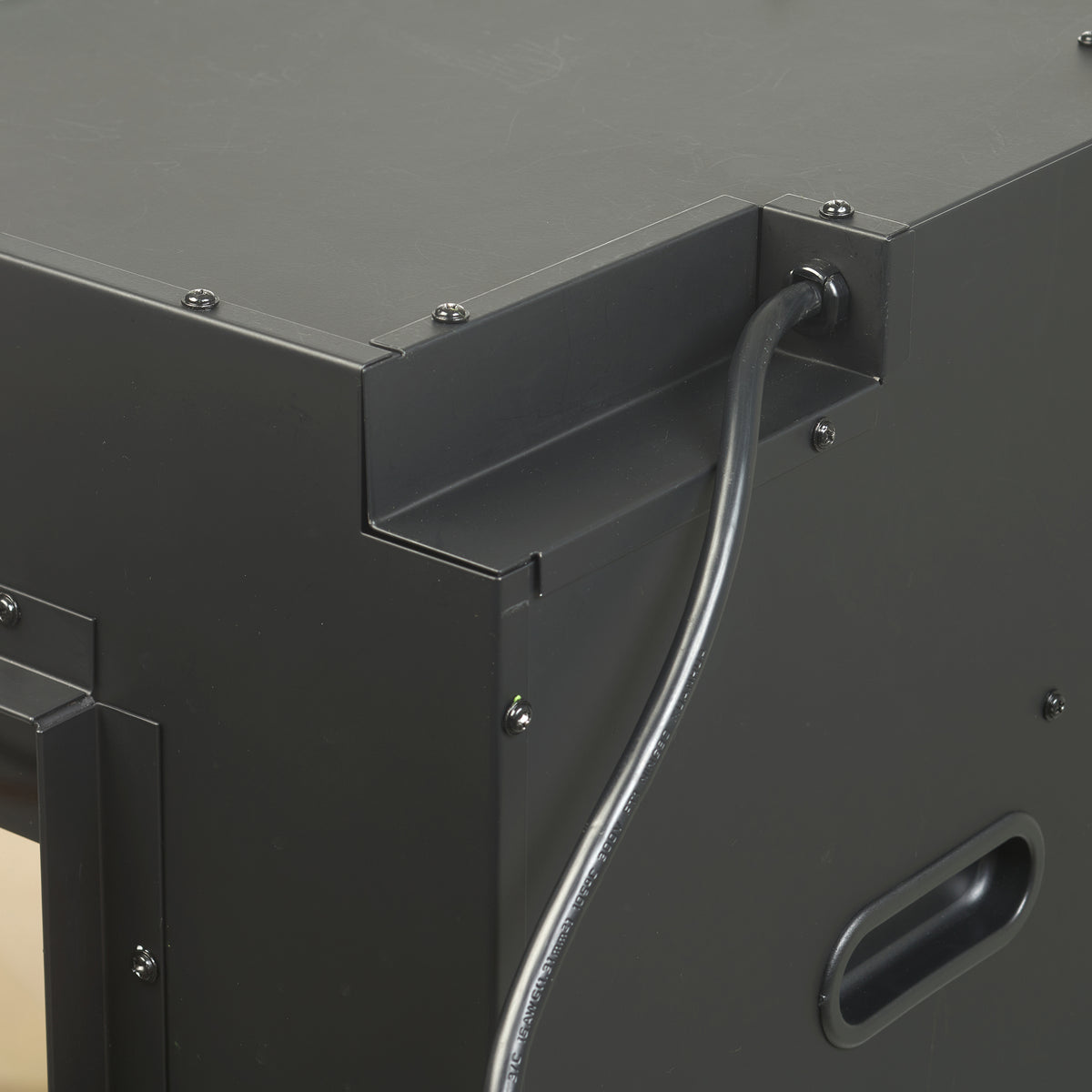 Black built-in linear electric fireplace cabinet with side handle and cable entry port