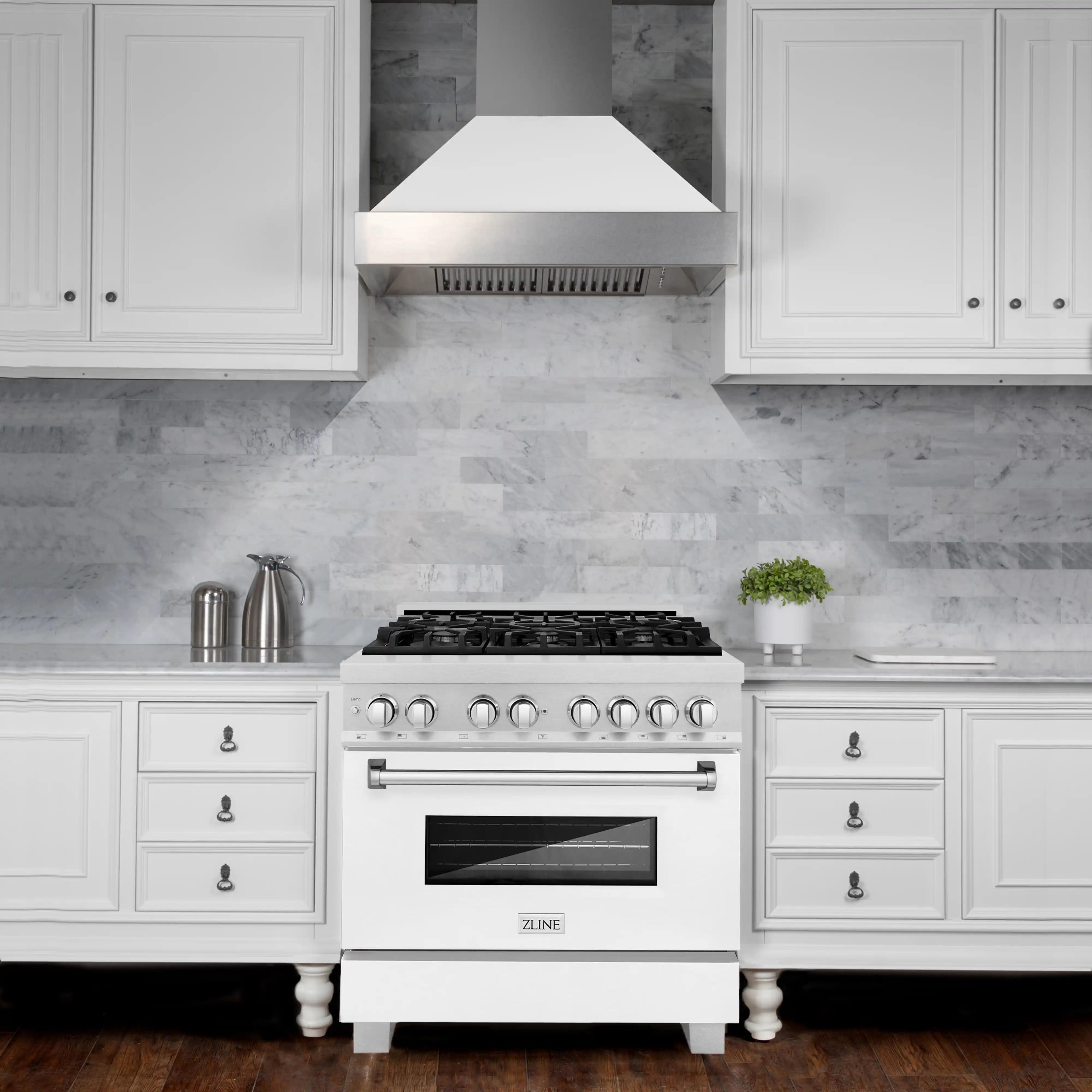 White dual fuel range with stainless burner grates and windowed oven door