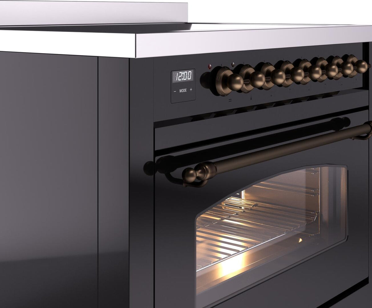 Freestanding electric induction range control panel and oven door with bronze trim