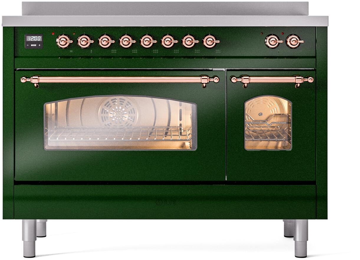 Emerald green oven control panel with copper knobs and windowed oven door