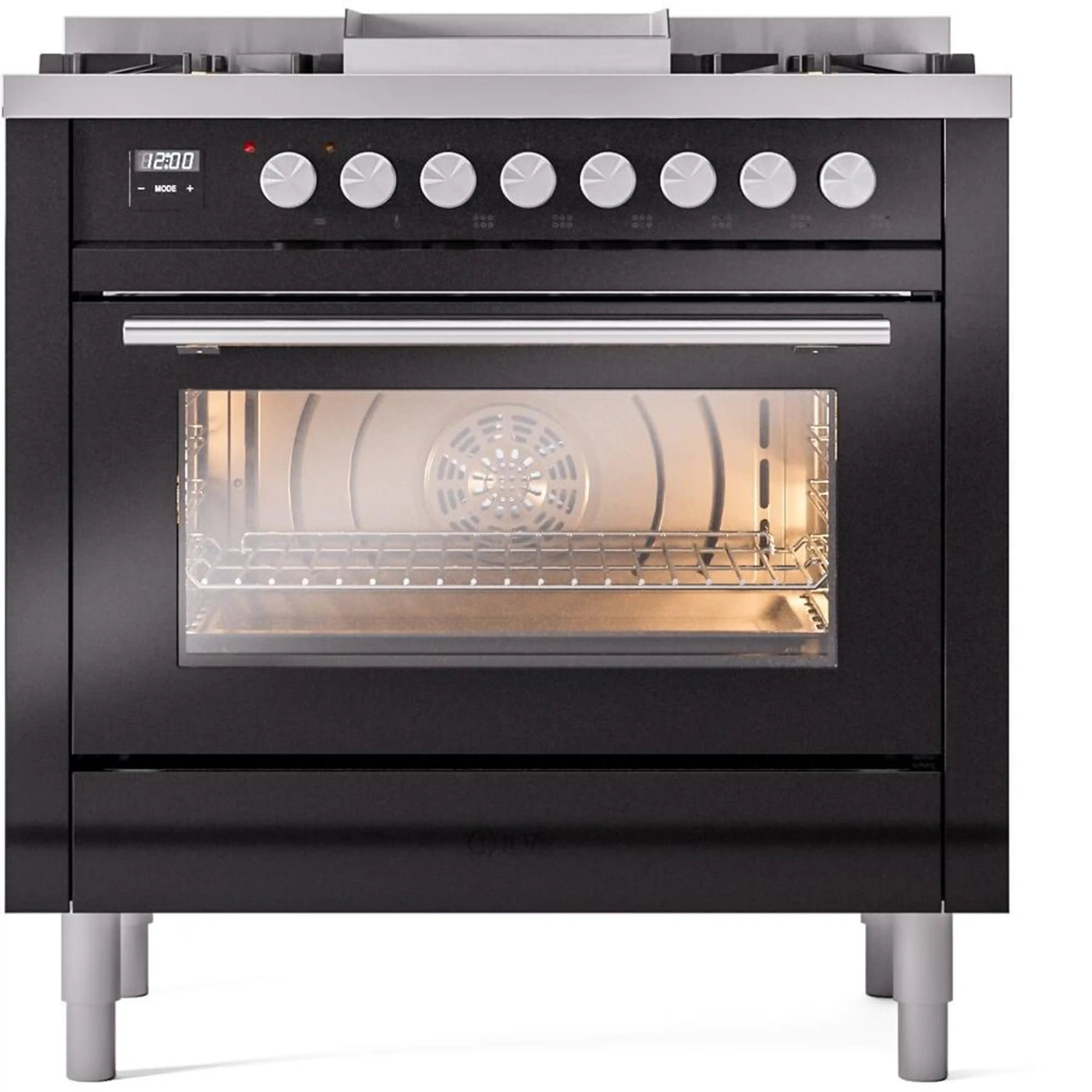 Black range front with row of control knobs and oven window with light on
