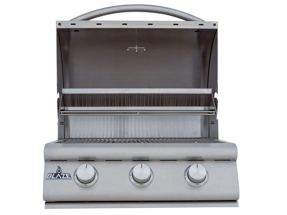 Open stainless 3-burner gas grill showing three burner knobs and inner hood