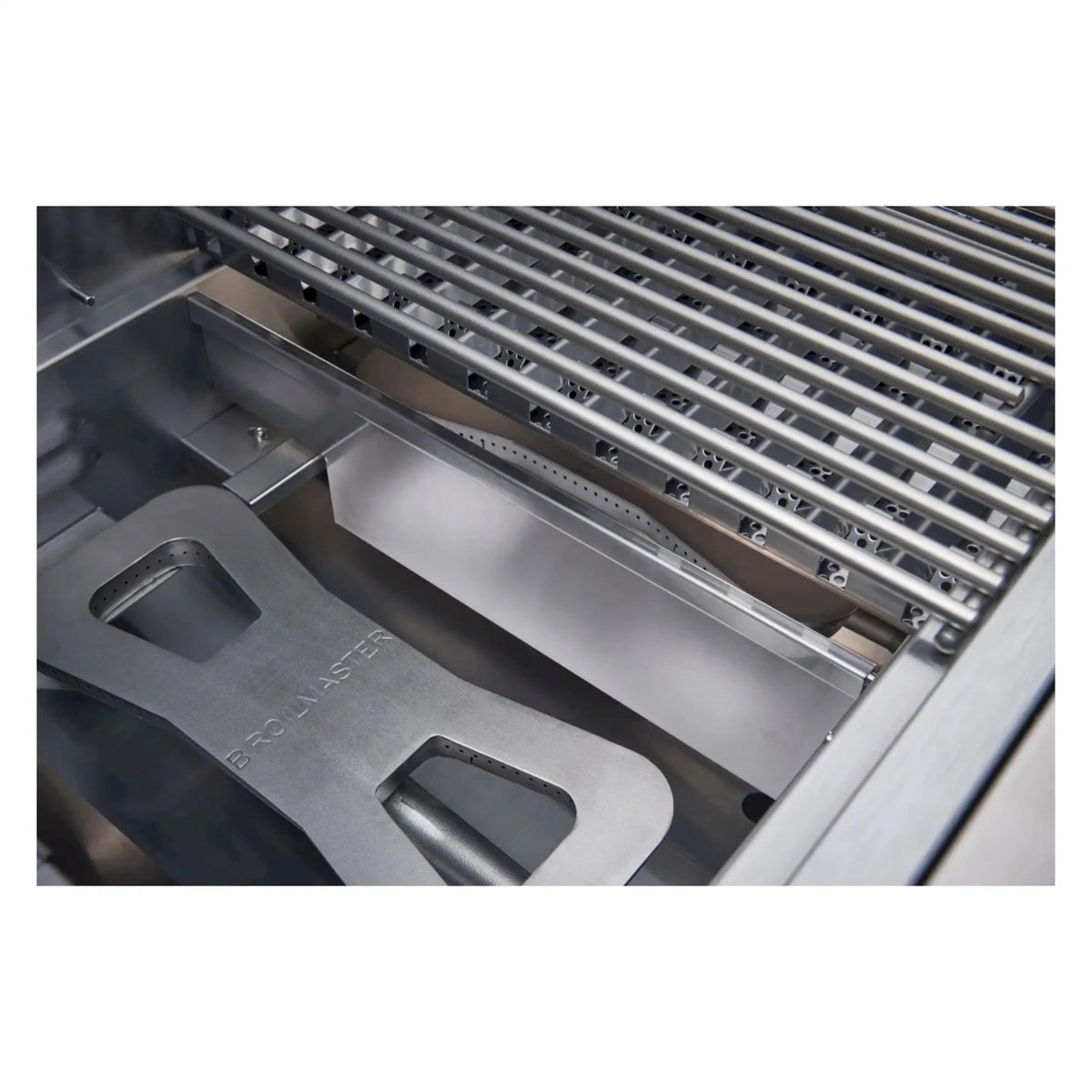 Stainless steel grill interior with cooking grates and burner rail assembly